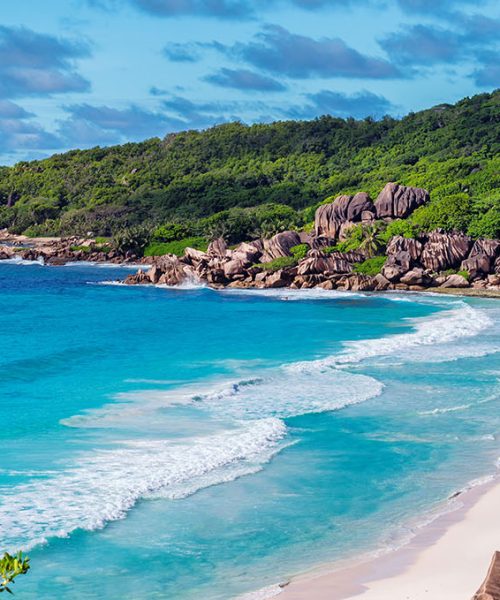 Sea view. Exotic sandy beach with beautiful rocks and turquoise